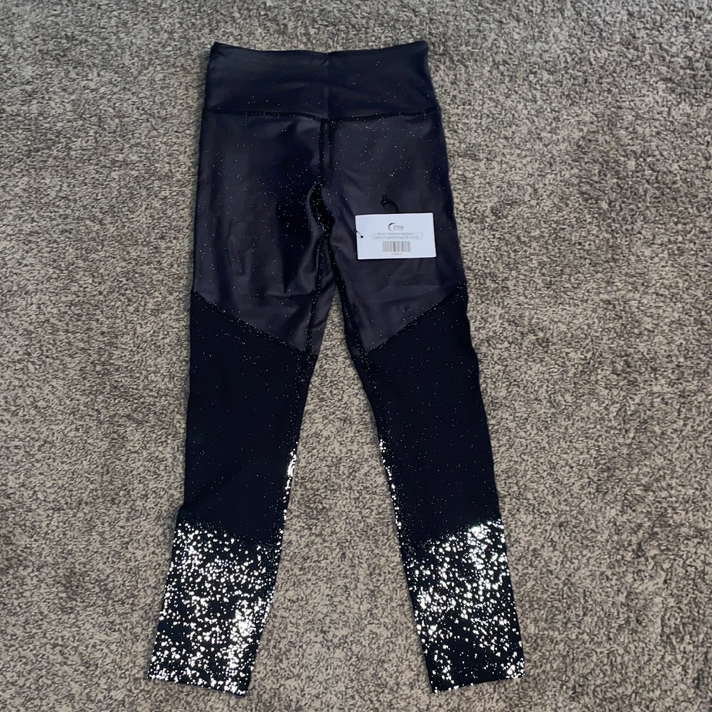 BRAND NEW ZYIA black reflective metallic light n tight hi-rise 7/8 24” size 4